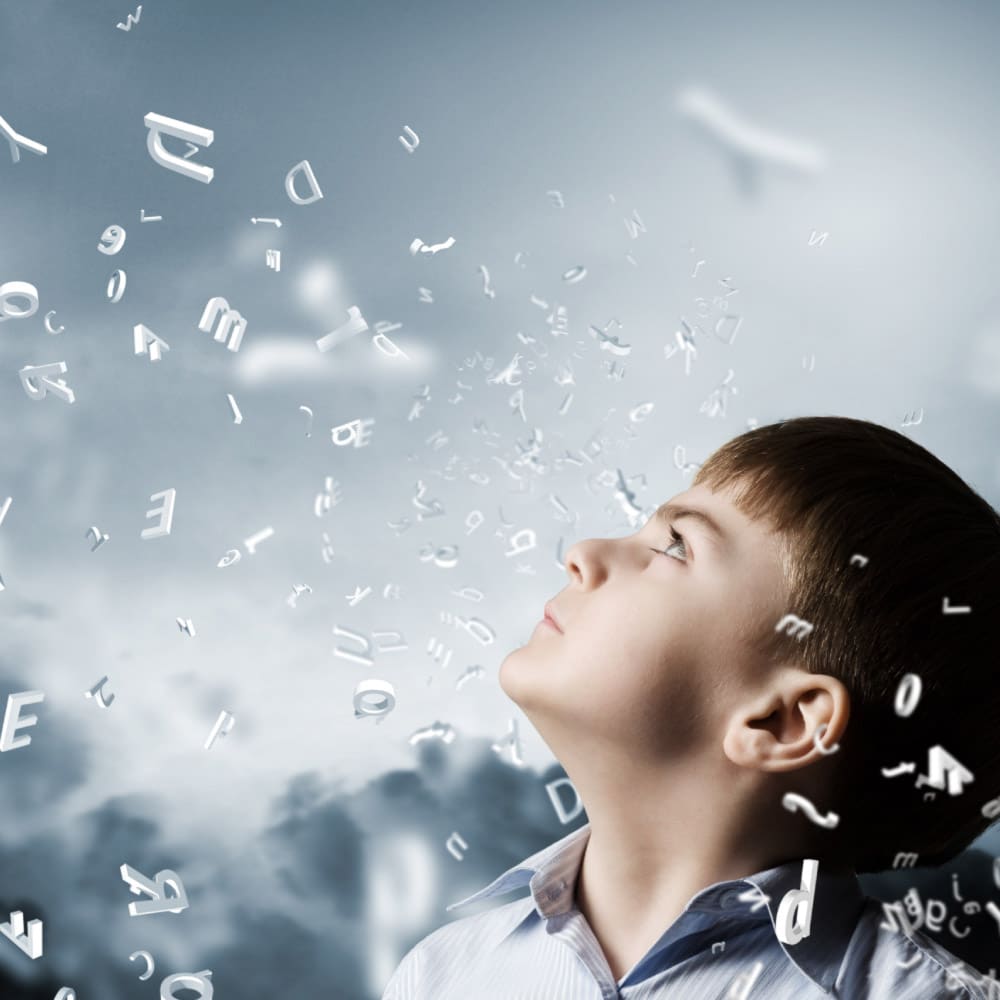 Student looking at the sky with letters falling like rain