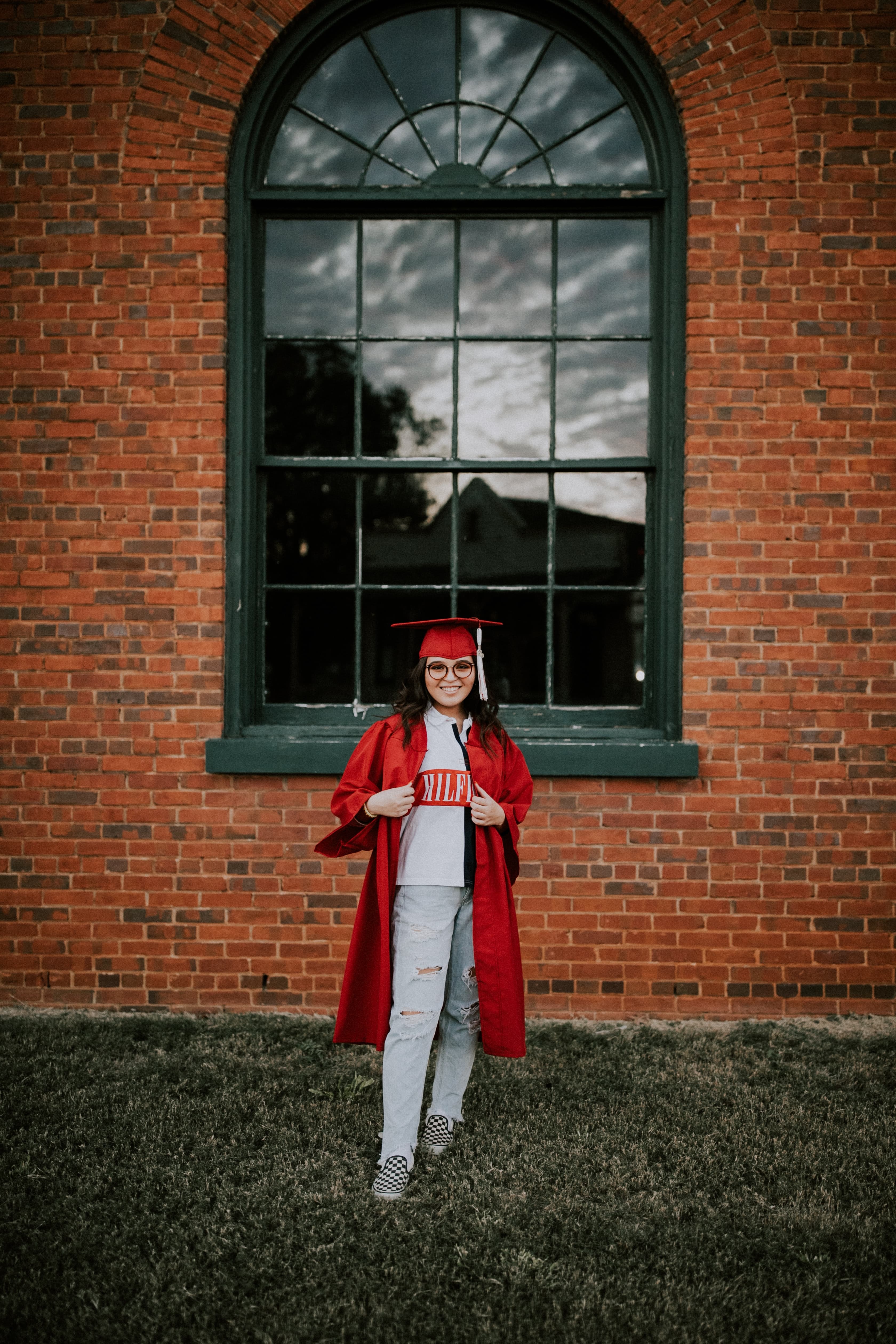 Student looking at the sky with letters falling like rain